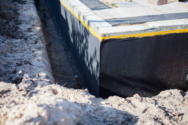 Professional Waterproofing technician working in Apison, TN